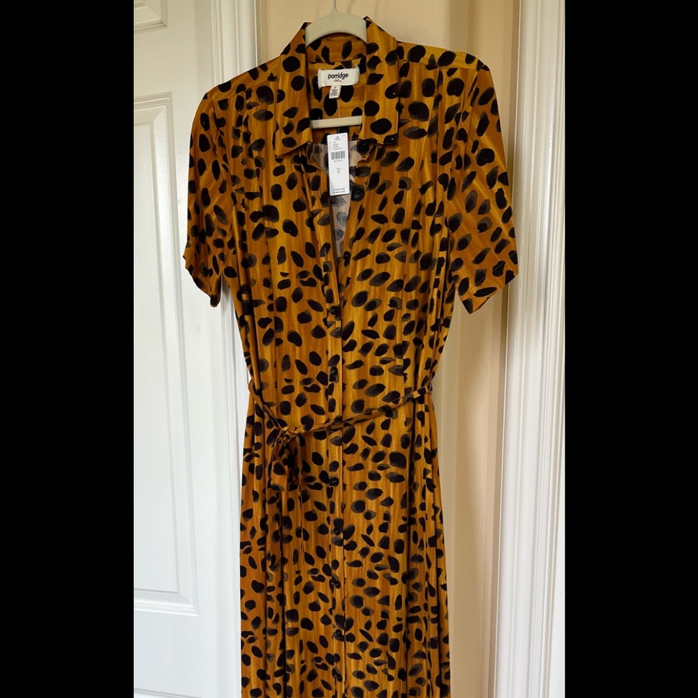 Maxi length button down dress with matching sash/belt. Lightweight. Never worn.